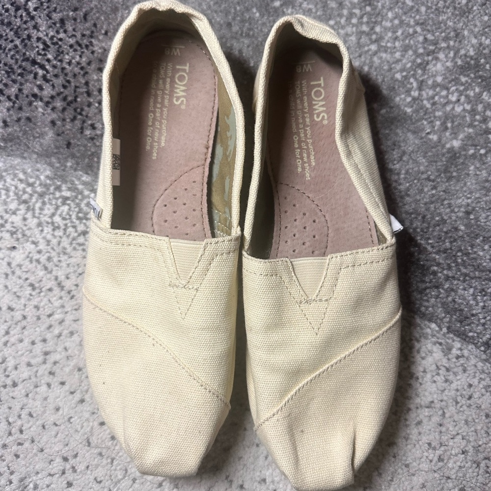 TOMS Beige Cream Canvas Slip-Ons